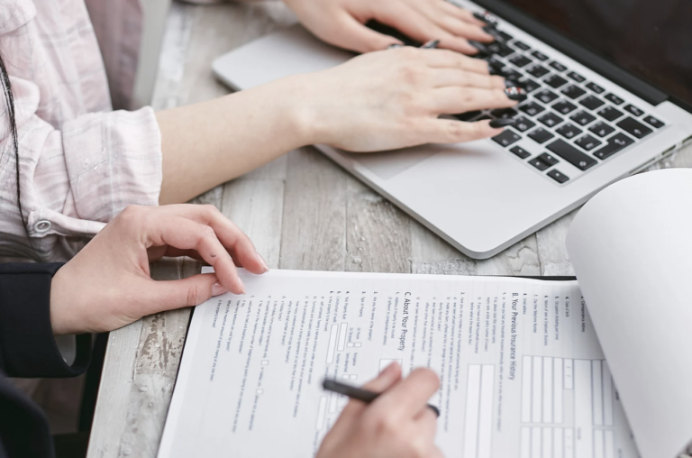 Individuals preparing legal documents, symbolising the importance of preparation for family law matters, including separation, child custody, and divorce.