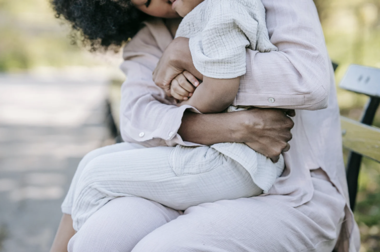 Mother and child hugging each other, representing support and comfort in child custody and family law matters.