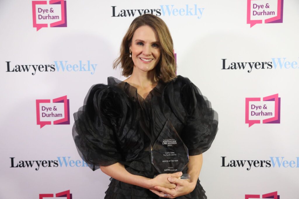 Carla Giles, Principal Solicitor at The Family Law Co., at the 2023 Women in Law Awards, smiling at the ceremony in recognition of her contributions to family law and mentoring.