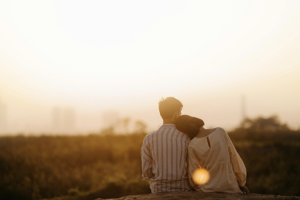 A couple sitting together, discussing their relationship and legal rights under family law in Newcastle and Maitland.